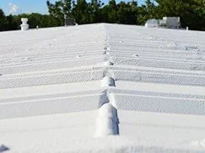 metalroofcoatingshawneeks Solid Rock Commercial Roofing Metal Roof Coating Shawnee, KS